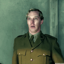 a man in a military uniform is making a face