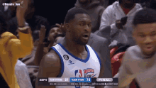 a basketball player wearing a jersey with ruffles on it