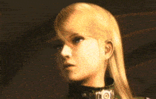 a close up of a woman 's face in a video game with blonde hair .