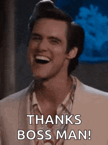 a man in a suit is laughing and saying `` thanks boss man ! ''