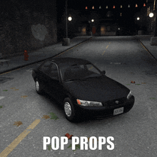 a black car is parked on a street with the words pop props above it