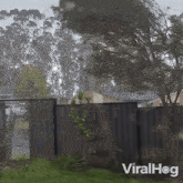 A Strong Storm Rips Away A Home'S Fence Viralhog GIF - A Strong Storm Rips Away A Home'S Fence Viralhog Storm Claws Fence From Home GIFs