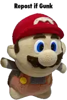 a stuffed mario with the words repost if gunk on the bottom