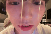 a close up of a person 's face with a light shining through it
