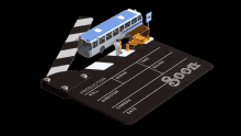 a clapper board with the words production roll director camera and date