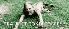 a black and white photo of a zombie crawling on the grass with the words `` tea , diet coke , coffe !!! ''