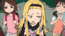 a girl with long blonde hair is wearing a black shirt that says barbie