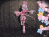 a girl in a pink dress is dancing with a shadow of a person