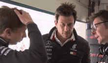 Toto Cheeky Smile Toto Wolff GIF - Toto Cheeky Smile Toto Wolff Sly GIFs