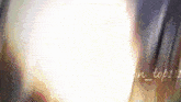 a blurry picture of a person 's face with the words on_top111 written in the corner
