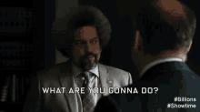 a man in a suit and tie is asking another man what are you gonna do .