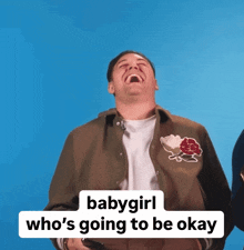 a man is laughing with a babygirl who 's going to be okay sticker above him