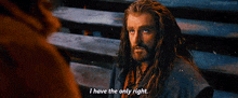 a man with long hair and a beard is talking to another man and says `` i have the only right '' .