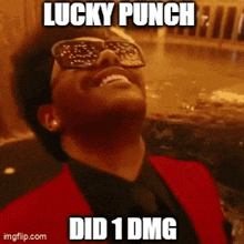 a man wearing sunglasses and a red suit says lucky punch