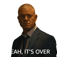 a man in a suit and tie has the words yeah it 's over on his face