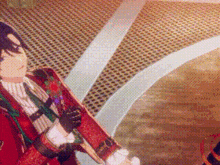 a man in a red suit is holding a skateboard in his hands .