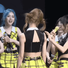a girl in a yellow plaid skirt is holding a microphone in her hand