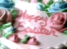 a cake that says happy easter surrounded by flowers