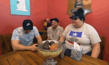 a woman wearing a shirt that says " do n't mess with texas " sits at a table