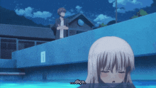 a girl in a swimming pool with a sign that says 1 on the side