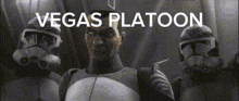 a group of stormtroopers are standing next to each other in a room with the words vegas platoon written on the bottom .