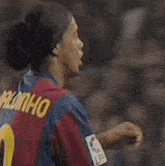 a close up of a soccer player wearing a number 10 jersey