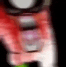 a close up of a person 's face with a blurred background and a black background .