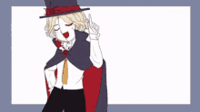 a person wearing a top hat and a cape is pointing up .