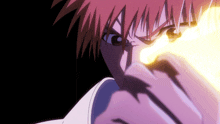 a close up of a person 's face with fire coming out of their mouth