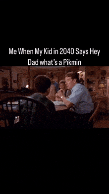 a man sits at a table with two children and says " me when my kid in 2040 says hey "