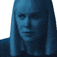 a close up of a woman 's face in a blue light