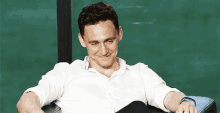 Relieved GIF - Tom Hiddleston Smile Happy GIFs