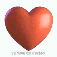 a red heart with the words `` te amo contessa '' written on it is floating in the air .