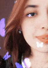 a woman with purple butterflies around her face