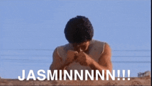 a man in a white tank top is saying jasminnnn !!