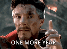 doctor strange is pointing at the camera with the words one more year written below him