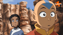 a boy and a girl are standing next to each other with a nickelodeon logo in the corner