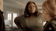 a woman with her hands on her hips is on a tv show called goodgirls