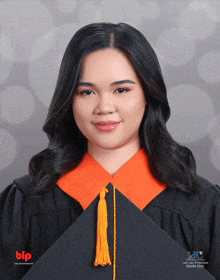 a woman wearing a graduation cap and gown with blp written on the bottom