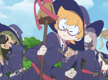a group of witches are standing in a line holding their brooms