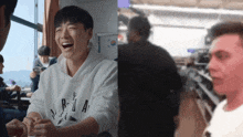 a man wearing a white sweatshirt with the letter r on it is laughing