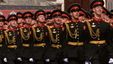 a group of men in military uniforms are lined up in a row
