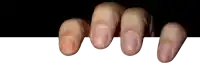 a close up of a person 's fingers holding a white board