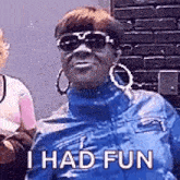 a woman wearing sunglasses and hoop earrings says `` i had fun '' .