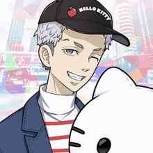 a man wearing a hello kitty hat is holding a hello kitty