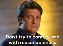 a man with the words " don 't try to confuse me with reasonableness " on the bottom
