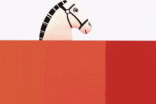 a white horse with a black mane and bridle is standing in a red box .