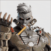 a man with a hammer in his mouth is wearing a robotic suit