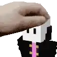 a pixel art of a person 's head with a hand holding it .