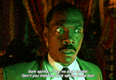 a man in a suit and tie is talking about dark spirits